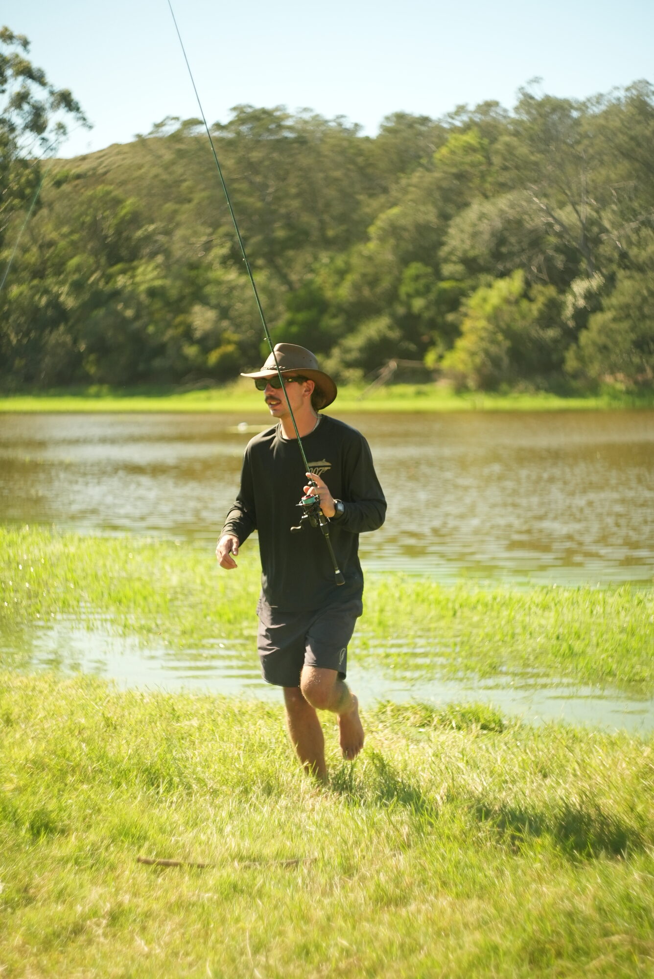 A quiet fishing and lifestyle session beside a green Cape lake.