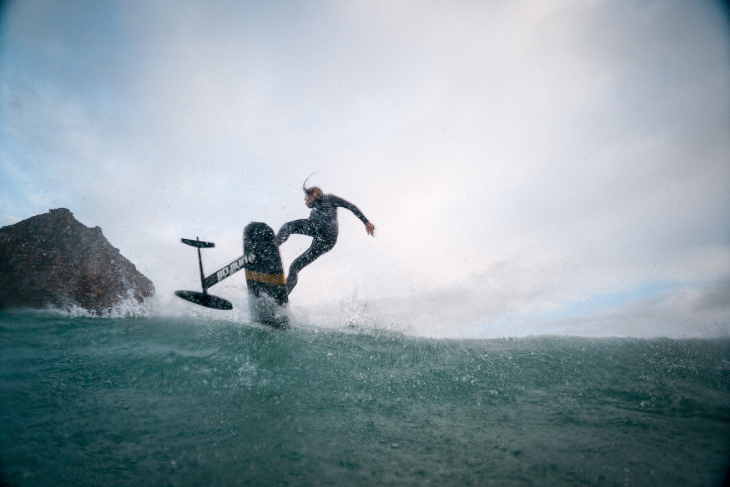 Rights-confirmed foiling action frame from Dylan Wichmann’s water archive.