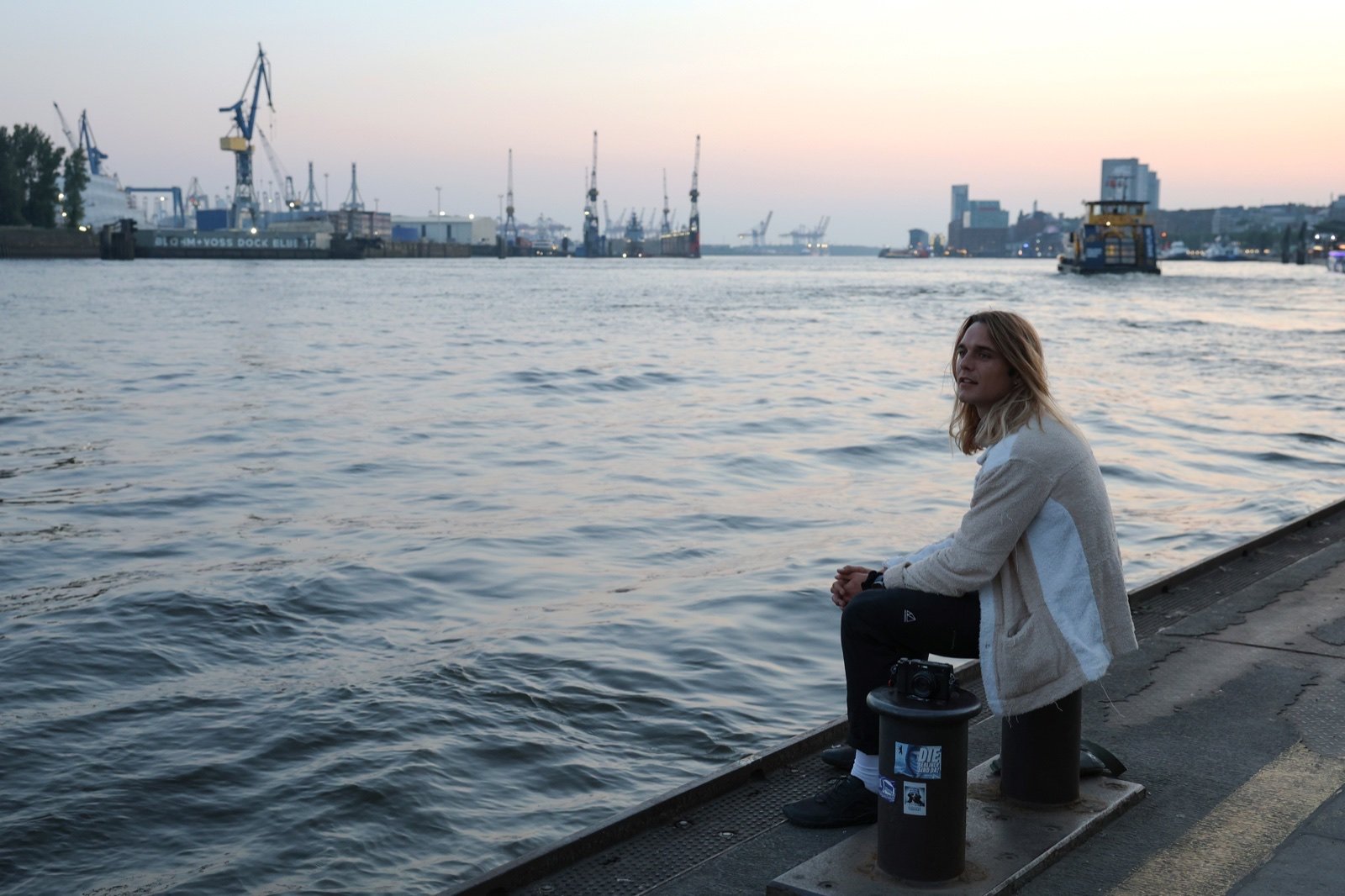 Dylan Wichmann in an urban waterside setting from the Germany series.