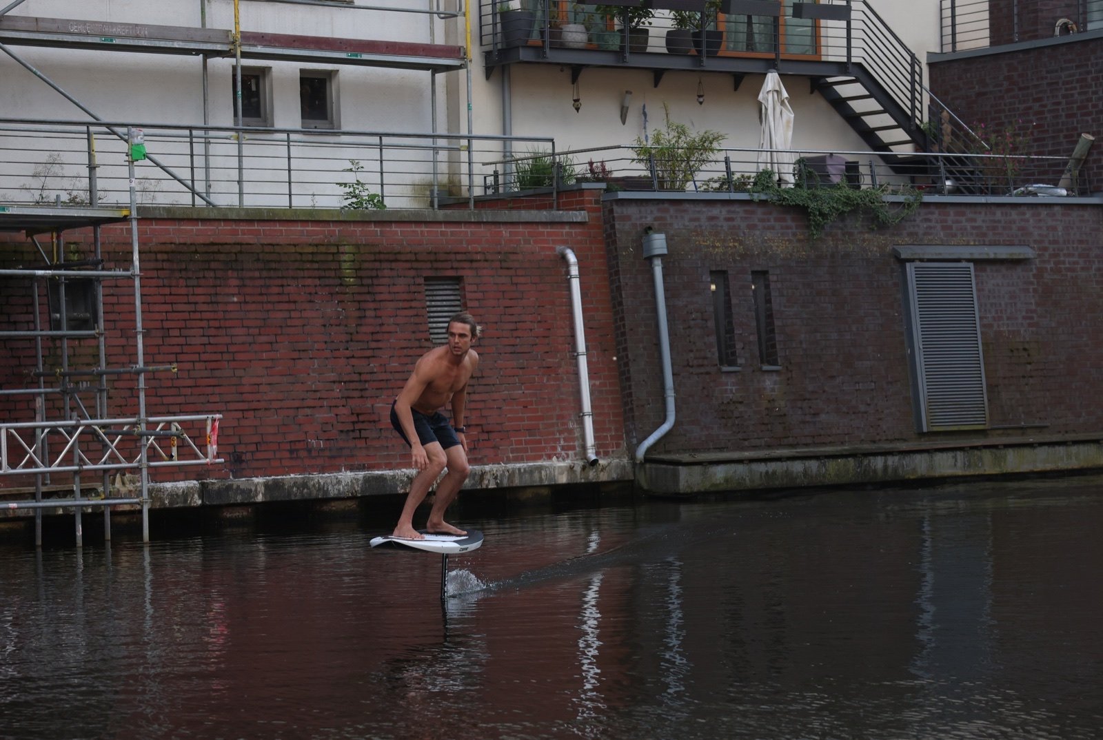 Dylan Wichmann in an urban waterside setting from the Germany series.