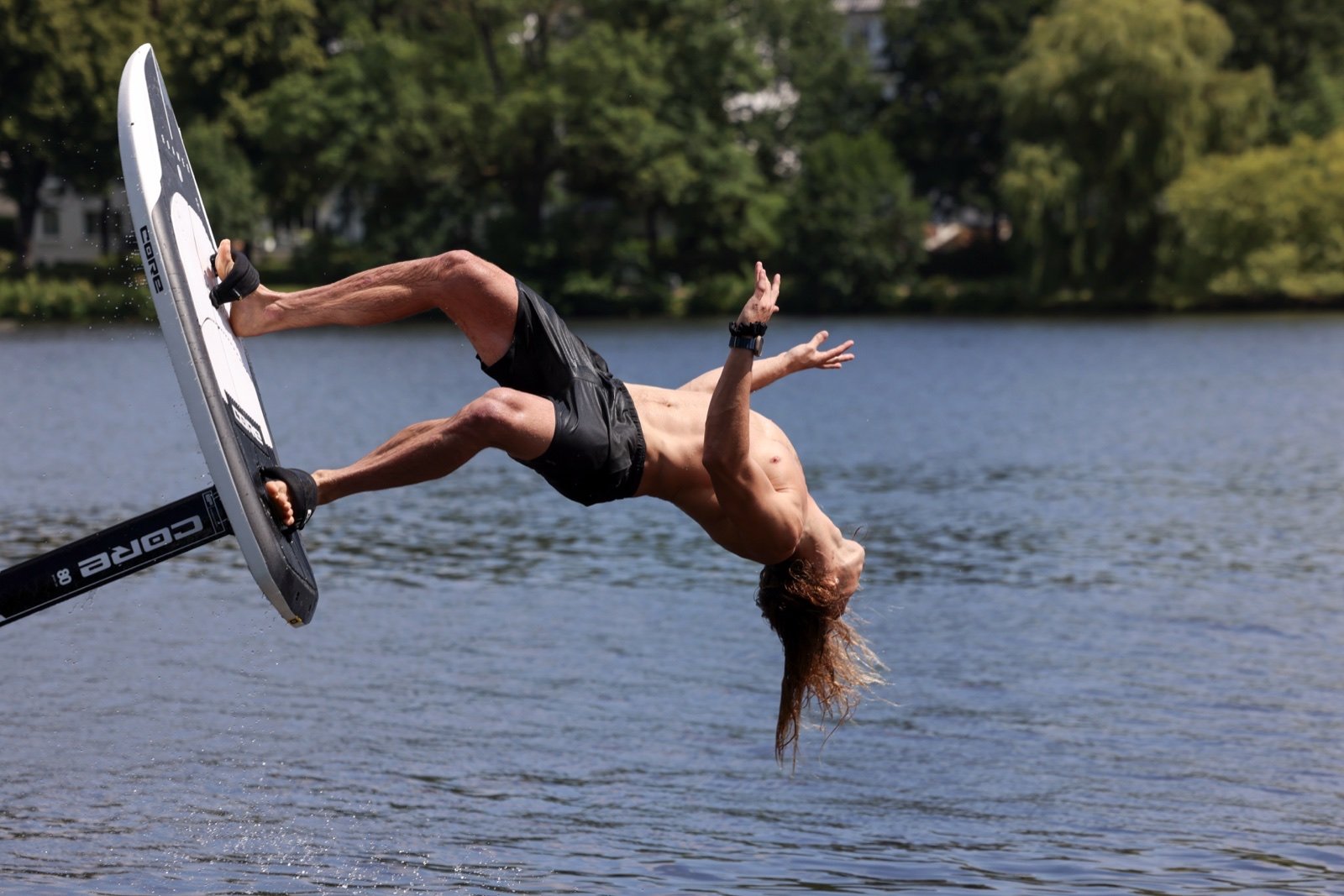 Lifestyle portrait of Dylan Wichmann in natural light near the water.